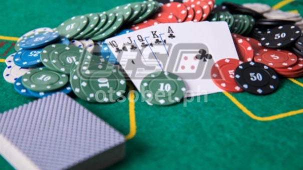 a deck of cards and chips on a table